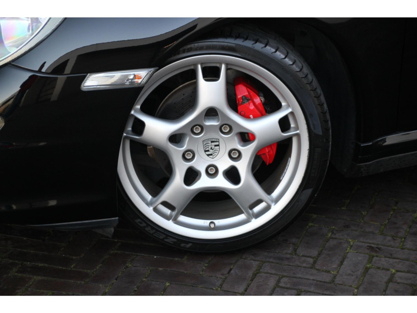 Porsche 911 3.6 Carrera 4 — foto 12 van 38
