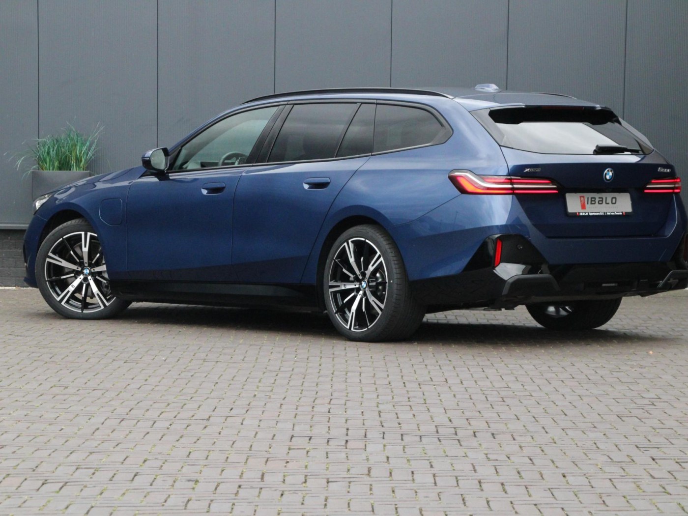 BMW 5-serie Touring 550e xDrive — foto 20 van 53