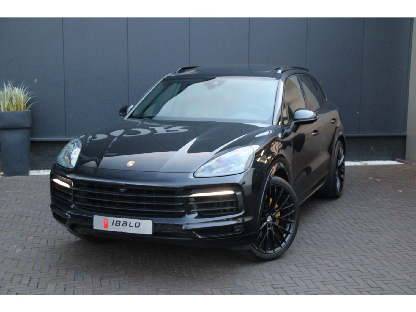 Porsche Cayenne 3.0 | MY2018 | PDCC | Capristo | 22” | pano | achteras | — foto 44 van 46